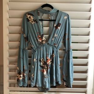 V- neck open front & back blue romper